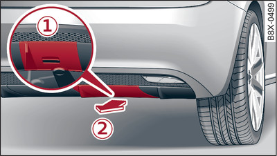 Example 2) right side of the rear bumper: Towline anchorage on vehicle with end trim